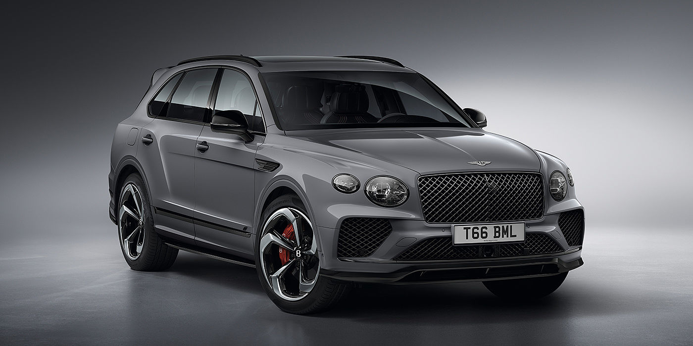 Bentley Bahrain Bentley Bentayga S in Cambrian Grey paint front three - quarter view with dark chrome matrix grille and featuring elliptical LED matrix headlights. 