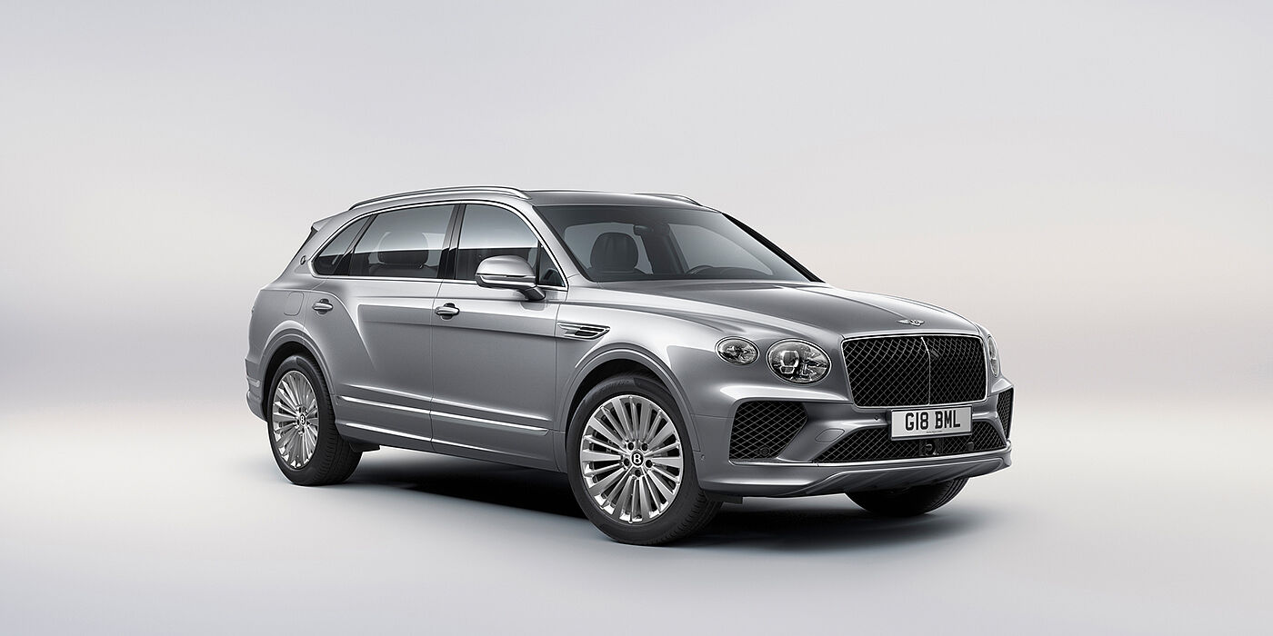 Bentley Bahrain Bentley Bentayga Extended Wheelbase luxury SUV front three quarter view in Moonbeam paint with 21 inch five spoke painted wheels