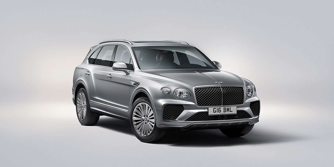 Bentley Bahrain Bentley Bentayga luxury SUV front three quarter view in Moonbeam paint with matrix grille and 21″ 5 spoke painted wheels