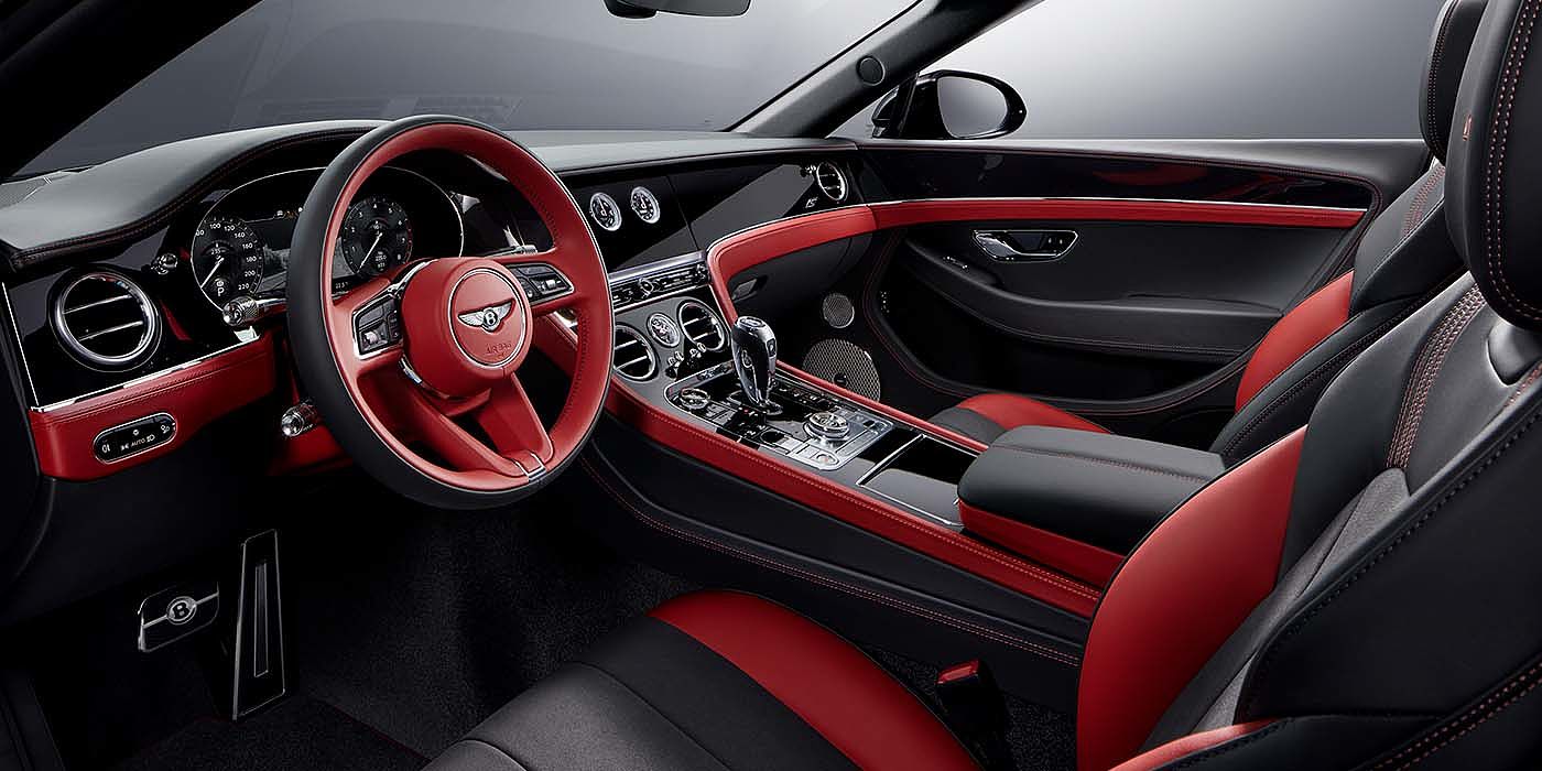 Bentley Bahrain Bentley Continental GTC S convertible front interior in Beluga black and Hotspur red hide with high gloss carbon fibre veneer