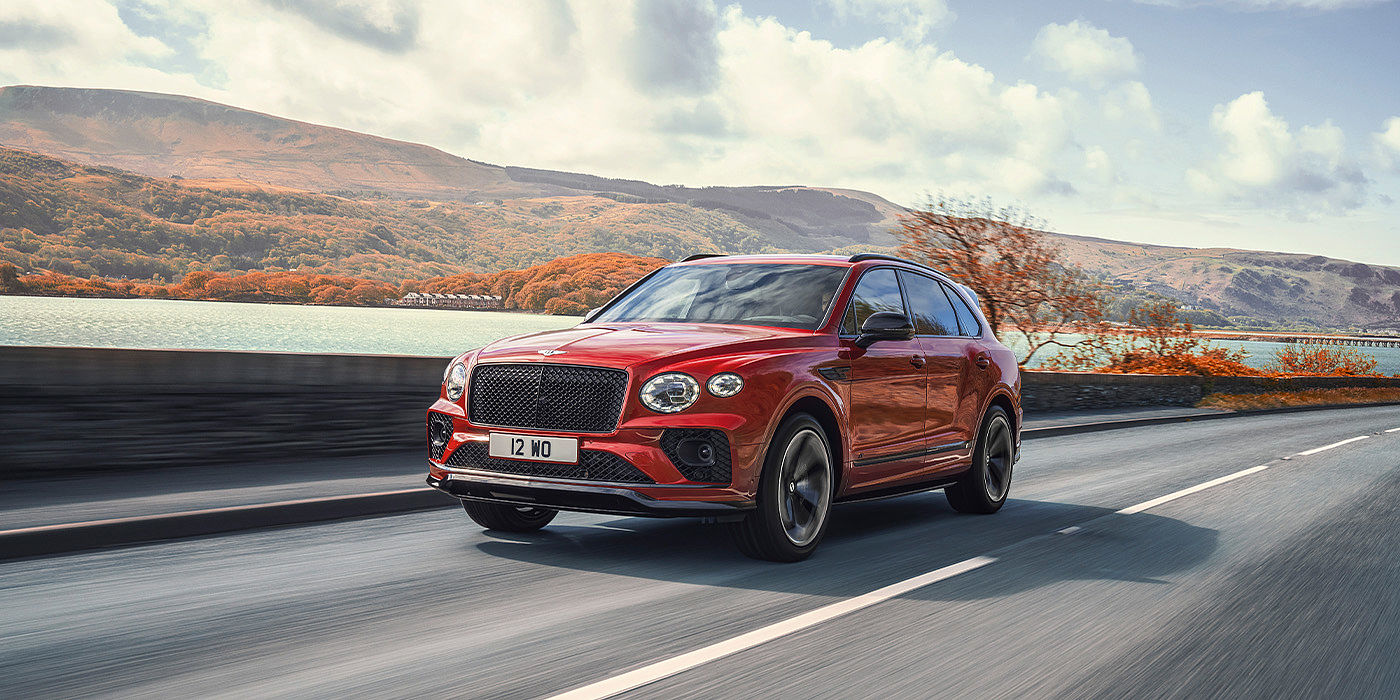Bentley Bahrain Bentley Bentayga S SUV in Candy Red paint front 34 dynamic