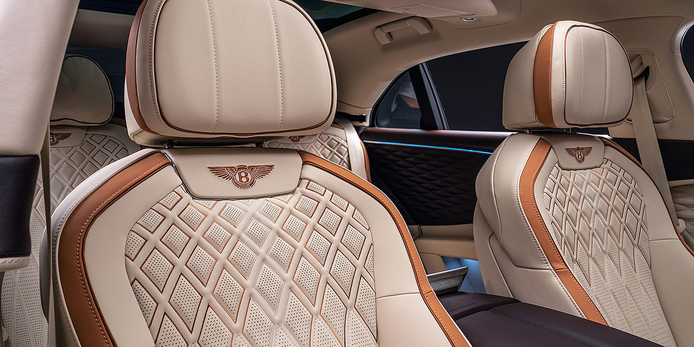 Bentley Bahrain Bentley Flying Spur Odyssean sedan rear seat detail with Diamond quilting and Linen and Burnt Oak hides
