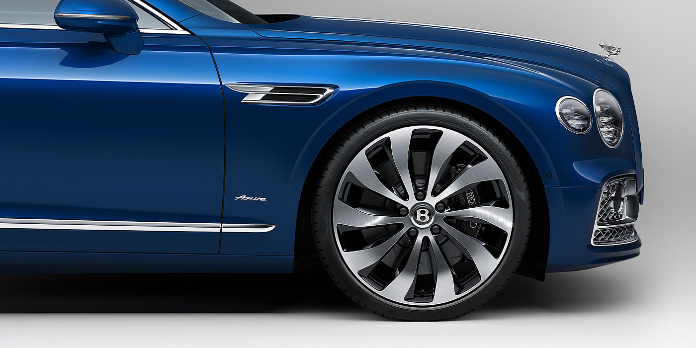 Bentley Bahrain Bentley Flying Spur Azure sedan side close up in Sequin Blue paint with Azure badge